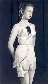 Female model wearing leg battery harness