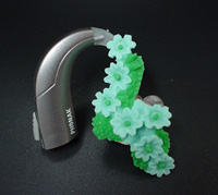 Contemporary hearing aid featuring floral design