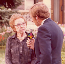 Helen L. Bruce and local TV reporter