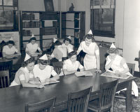 Students use the library of the Washington University School of Nursing, 1942