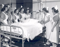 Bedside nursing instruction, ca. 1952